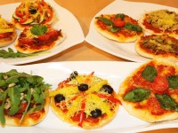 Verschiedene Mini-Pizza Variationen